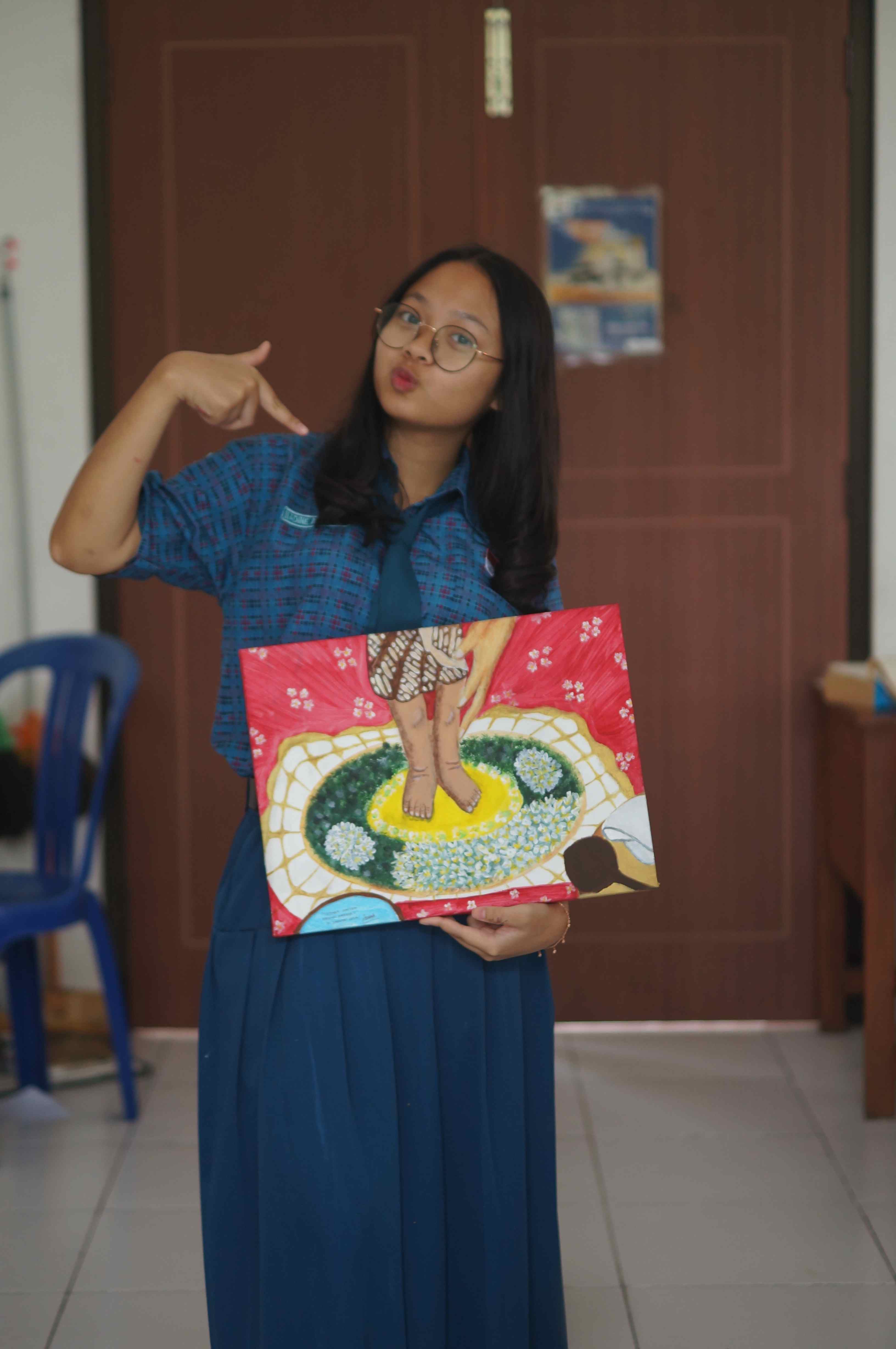 Photo of Enggar and Judul